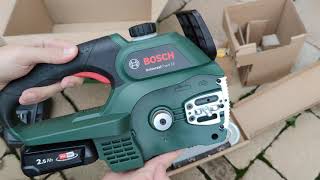 Unpacking  unboxing cordless chainsaw Bosch Universal Chain 18 06008B8000 [upl. by Hairym443]